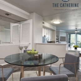 dining table with seating and a bar