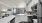 a kitchen with white cabinets