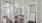 a hallway with view of rooms and a washing machine