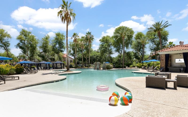 The Catherine luxury townhomes in Scottsdale with resort-style pool and lounge areas.